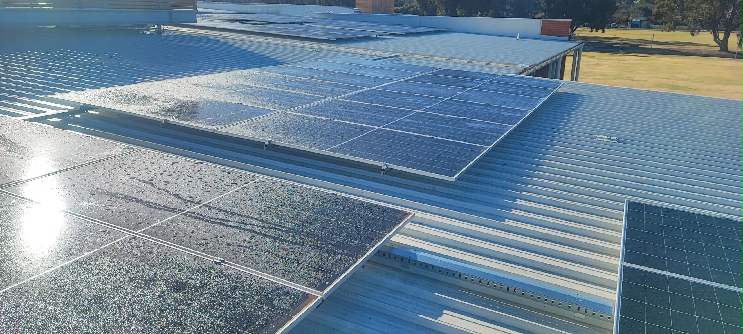 OptiMount cable tray running along a metal roof